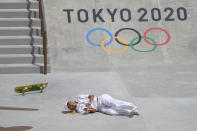 Aori Nishimura of Japan falls as he competes in the women's street skateboarding finals at the 2020 Summer Olympics, Monday, July 26, 2021, in Tokyo, Japan.(AP Photo/Ben Curtis)