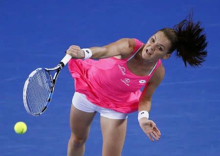 Poland's Agnieszka Radwanska serves during her third round match against Puerto Rico's Monica Puig at the Australian Open tennis tournament at Melbourne Park, Australia, January 22, 2016. REUTERS/Jason O'Brien