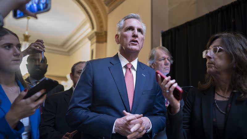 Speaker of the House Kevin McCarthy, R-Calif., walks with reporters at the Capitol in Washington on Thursday, June 22, 2023.