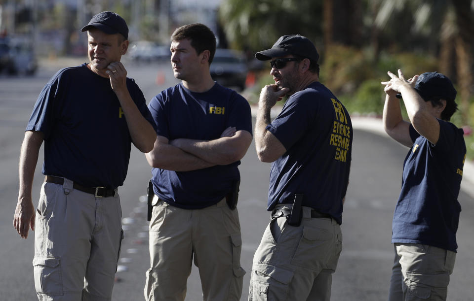 <p>FBI investigators observe the scene of a shooting near the Mandalay Bay casino, Tuesday, Oct. 3, 2017, in Las Vegas. (Photo: John Locher/AP) </p>