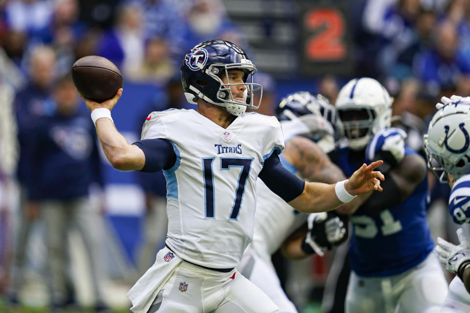 Tennessee Titans quarterback Ryan Tannehill (17) throws against the Indianapolis Colts in the first half of an NFL football game in Indianapolis, Sunday, Oct. 31, 2021. (AP Photo/Darron Cummings)