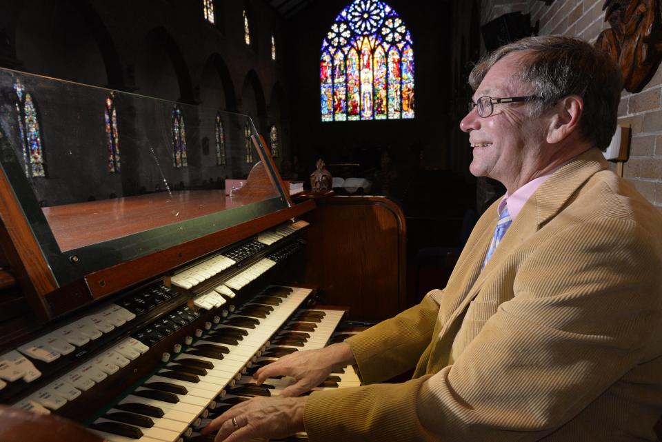 Steve Lange plays the pipe organ at St. Paul's Episcopal Church, where he was the minister of music for 45 years.