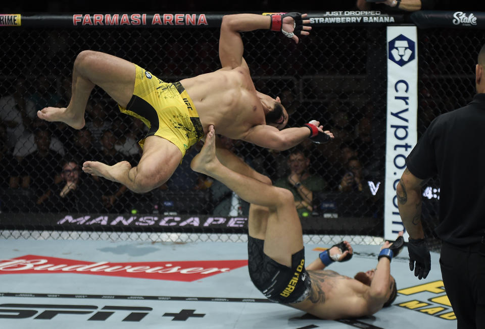 Michel Pereira's shin connected with Ihor Potieria's head at the end of this backflip. (Alexandre Loureiro/Zuffa LLC via Getty Images)