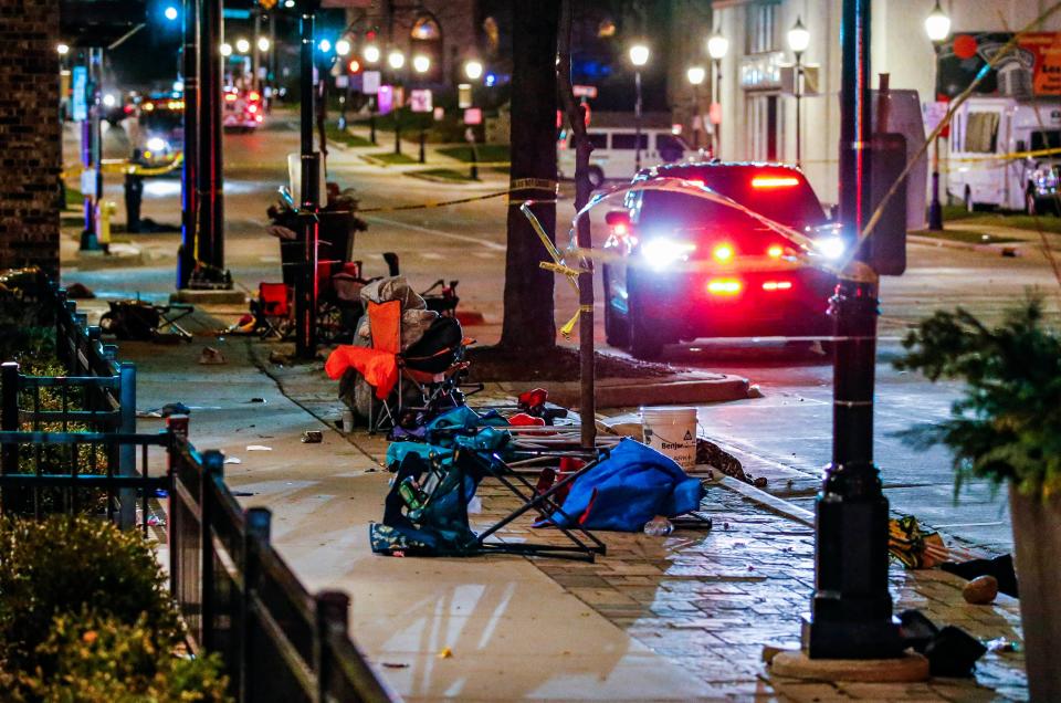 November 21, 2021; Waukesha, WI, USA; Abandoned chairs, blankets and other items remain along W. Main St. in downtown Waukesha after a vehicle plowed through the Christmas Parade, leaving multiple people injured on Sunday, Nov. 21, 2021. Mandatory Credit: Scott Ash-USA TODAY NETWORK