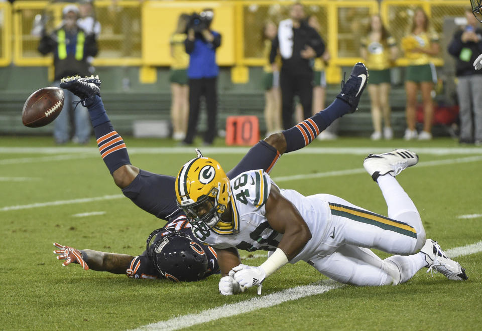 <p>Green Bay Packers linebacker Joe Thomas (48) breaks up a pass intended for Chicago Bears wide receiver Josh Bellamy (15) in the second quarter at Lambeau Field. Mandatory Credit: Benny Sieu-USA TODAY Sports </p>