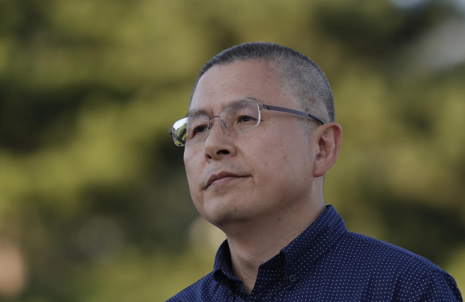 Hwang Kyo-ahn, the main opposition Liberty Korea Party chairman, stands after shaved head in Seoul, South Korea, Monday, Sept. 16, 2019. The leader of South Korea's biggest opposition party has become the latest politician to shave their heads to protest President Moon Jae-in's appointment of a key political ally as justice minister despite allegations of academic fraud and financial crimes surrounding his family. (AP Photo/Lee Jin-man)