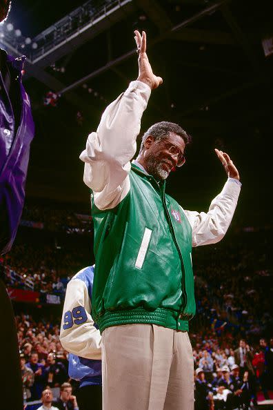 CLEVELAND - FEBRUARY 9 : Bill Russell waves to the crowd as he was introduced as one of the 50 best players in NBA history during half time at the All-Star Game at Gund Arena on February 9th 1997 in Cleveland, Ohio. NOTE TO USER: User expressly acknowledges  and agrees that, by downloading and or using this  photograph, User is consenting to the terms and conditions of the Getty Images License Agreement. Mandatory copyright notice: Copyright NBAE 2002 (Photo by Andrew D. Bernstein/ NBAE/ Getty Images)