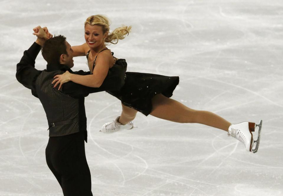 Kirsten Moore-Towers and Dylan Moscovitch of Canada compete during the Team Pairs Free Skating Program at the Sochi 2014 Winter Olympics, February 8, 2014. REUTERS/David Gray (RUSSIA - Tags: SPORT FIGURE SKATING SPORT OLYMPICS)