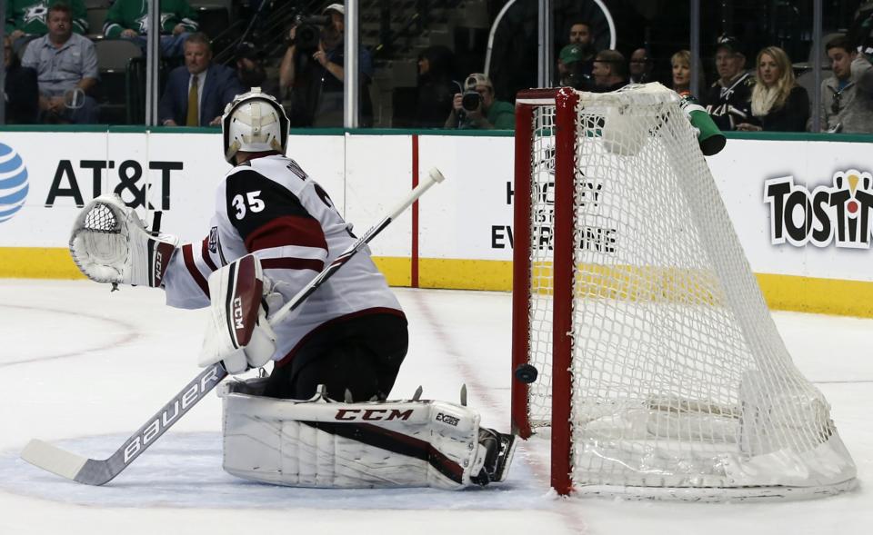 Arizona Coyotes goalie Louis Domingue is unable to stop the shot from Dallas Stars’ Cody Eakin during the third period of an NHL hockey game, Friday, Feb. 24, 2017, in Dallas. (AP Photo/Mike Stone)