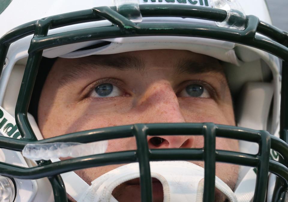 Tim Tebow #15 of the New York Jets looks on from the sideline during an NFL game against the Buffalo Bills at Ralph Wilson Stadium on December 30, 2012 in Orchard Park, New York. (Photo by Tom Szczerbowski/Getty Images)