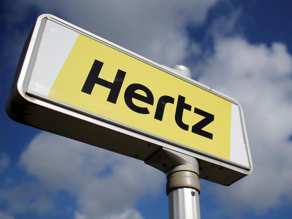 FILE PHOTO: The logo of the American car rental company Hertz is seen at the Nantes-Atlantique airport in Bouguenais near Nantes, western France, April 7, 2016.  REUTERS/Stephane Mahe