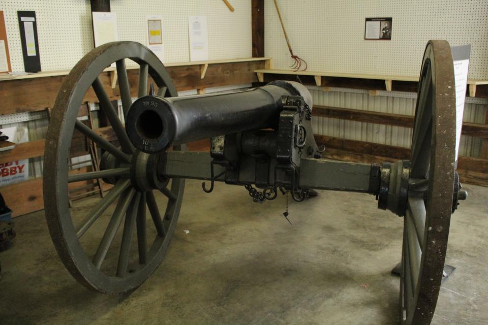 A 10-pounder Parrott Rifle in the Antique Barn at the Civil War Show.
