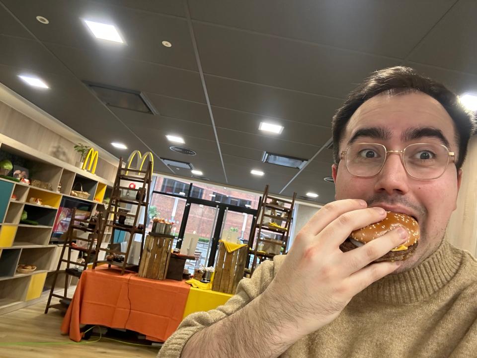 Harry Kersh takes a bite of a new recipe Quarter Pounder with Cheese