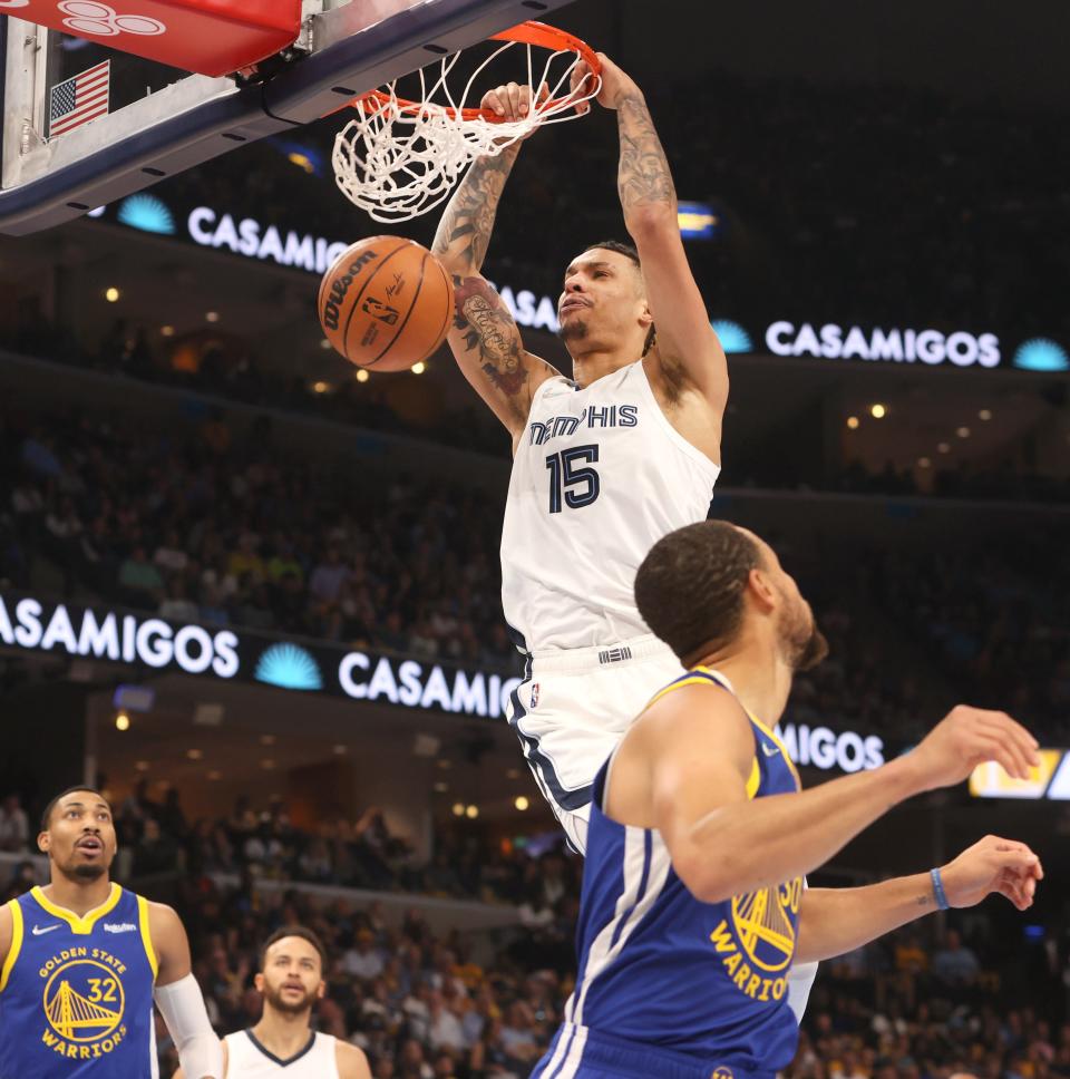 May 1, 2022; Memphis, Tennessee, USA; Memphis Grizzlies forward Brandon Clarke (15) dunks the ball against the Golden State Warriors during game one of the second round for the 2022 NBA playoffs at FedExForum. Mandatory Credit: Joe Rondone-USA TODAY Sports