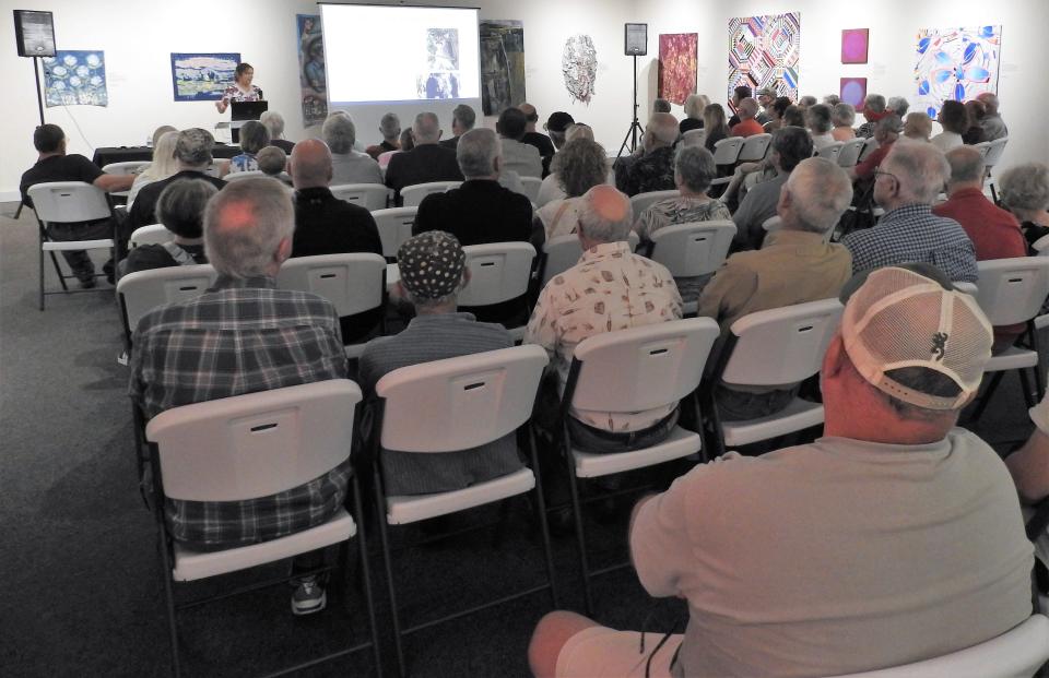More than 80 people attended a presentation at the Johnson-Humrickhouse Museum on a study by Ohio State University on bobcats moving back into Coshocton County after near extinction in the state in the mid-1800s.