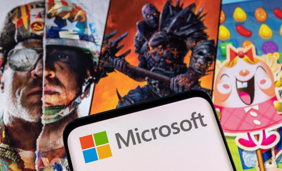 Microsoft logo is seen on a smartphone placed on displayed Activision Blizzard's games characters in this illustration taken January 18, 2022. REUTERS/Dado Ruvic/Illustration