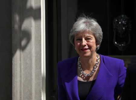 FILE PHOTO: Britain's Prime Minister Theresa May leaves 10 Downing Street in Westminster, London, Britain, July 18, 2018. REUTERS/Hannah McKay