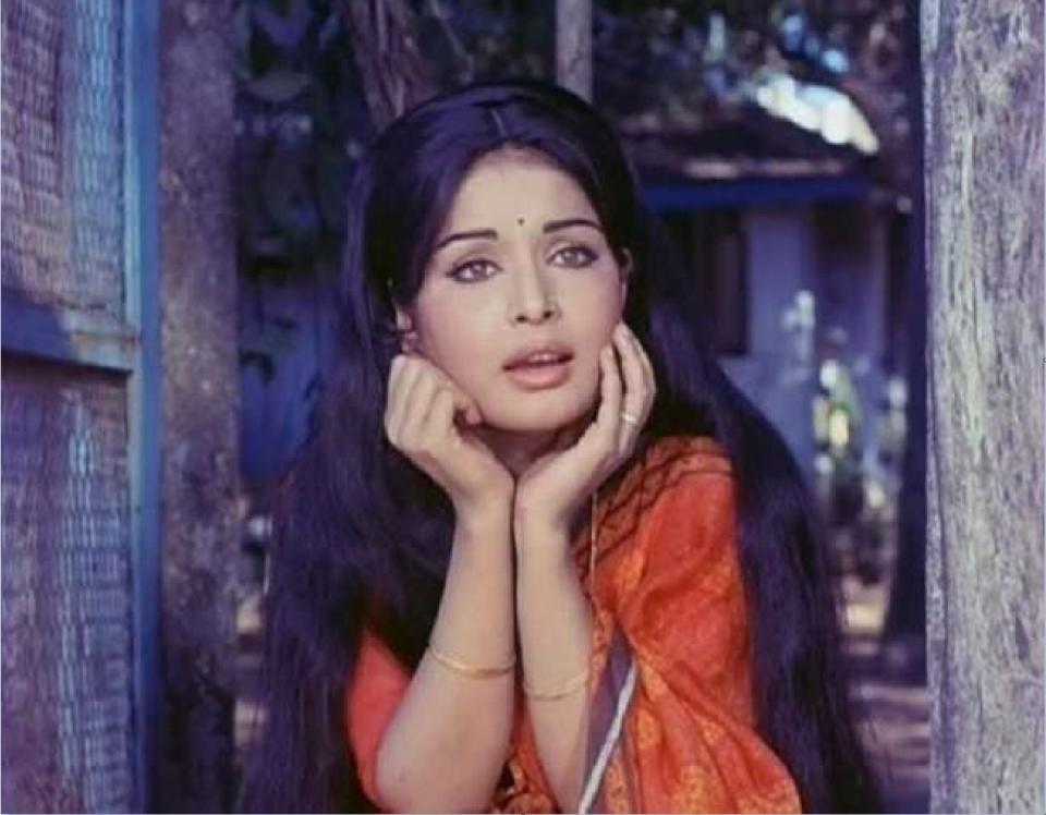 Two regional films were enough for her to grab the attention of Mumbai filmmakers. In 1970, paired opposite Dharmendra, she made her first appearance on the screen of Hindi cinema. <em>Jeevan Mrityu</em> was a box office success and sealed the debutante actress's career in Bollywood.