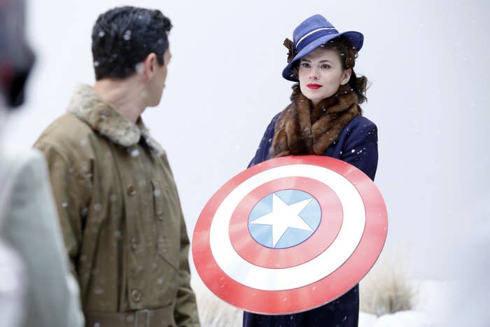 Hayley Atwell holds Captain America's shield
