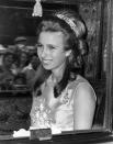 <p>To accompany her mother to the State Opening of Parliament in 1970, Princess Anne embellished her up-do with a graphic diamond bandeau, known as Princess Andrew’s Meander Tiara. </p><p>It once belonged to her paternal grandmother, Princess Andrew of Greece (mother of the Duke of Edinburgh) and the name ‘meander’ refers its stylised Greek ‘key’ pattern – a popular design in the early 20th century. The central diamond, which can just be seen peeking out from beneath the Princess’ hair, is framed by sparkling laurel leaves and there are two honeysuckle motifs punctuating the band on either side of it. </p><p>This striking jewel, which may remind the Princess of her Greek heritage, was officially given to Anne by the Queen in 1972 and has become a particular favourite. Touchingly, it’s also the tiara she lent to her daughter, Zara Phillips, for her wedding in 2011. <br></p>