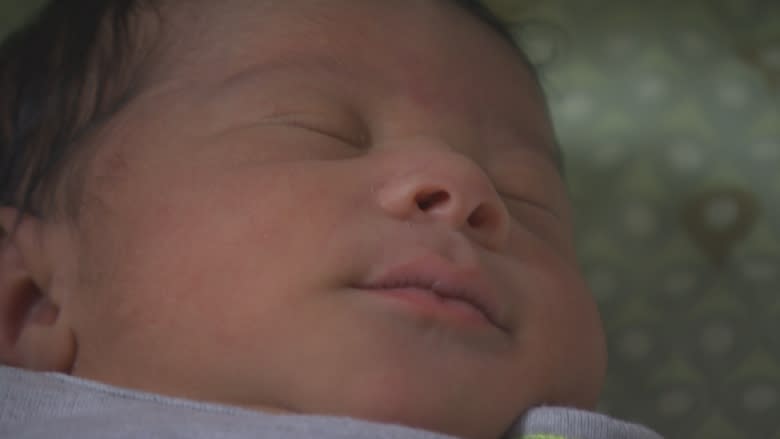 Dramatic birth on front lawn brings neighbours together