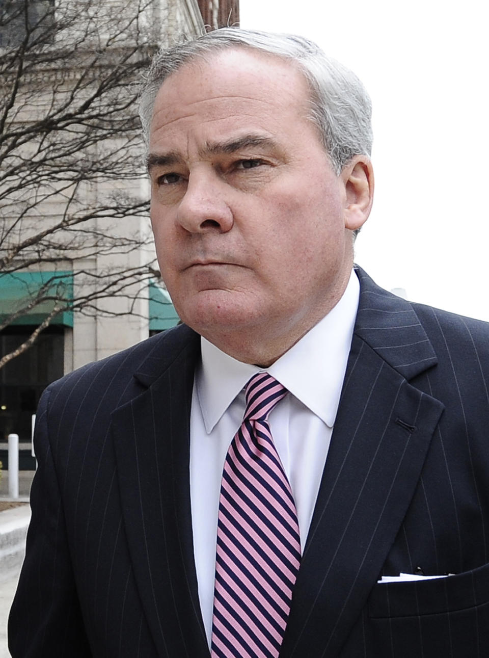 Former Connecticut Gov. John G. Rowland arrives at federal court, Friday, April 11, 2014, in New Haven, Conn. A grand jury on Thursday returned a seven-count indictment alleging Rowland schemed to conceal involvement with congressional campaigns. (AP Photo/Jessica Hill)