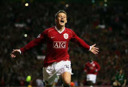 FILE PHOTO: Football Soccer- Manchester United v Celtic UEFA Champions League Group Stage Matchday One Group F - Old Trafford, Manchester, Britain - September 13, 2006 Ole Gunnar Solskjaer celebrates after scoring Manchester United's third goal Action Images via Reuters/Michael Regan / File Photo