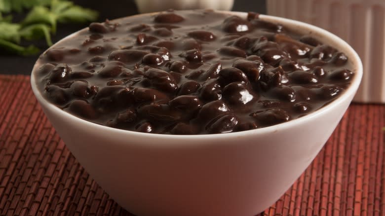 A bowl of cooked black beans