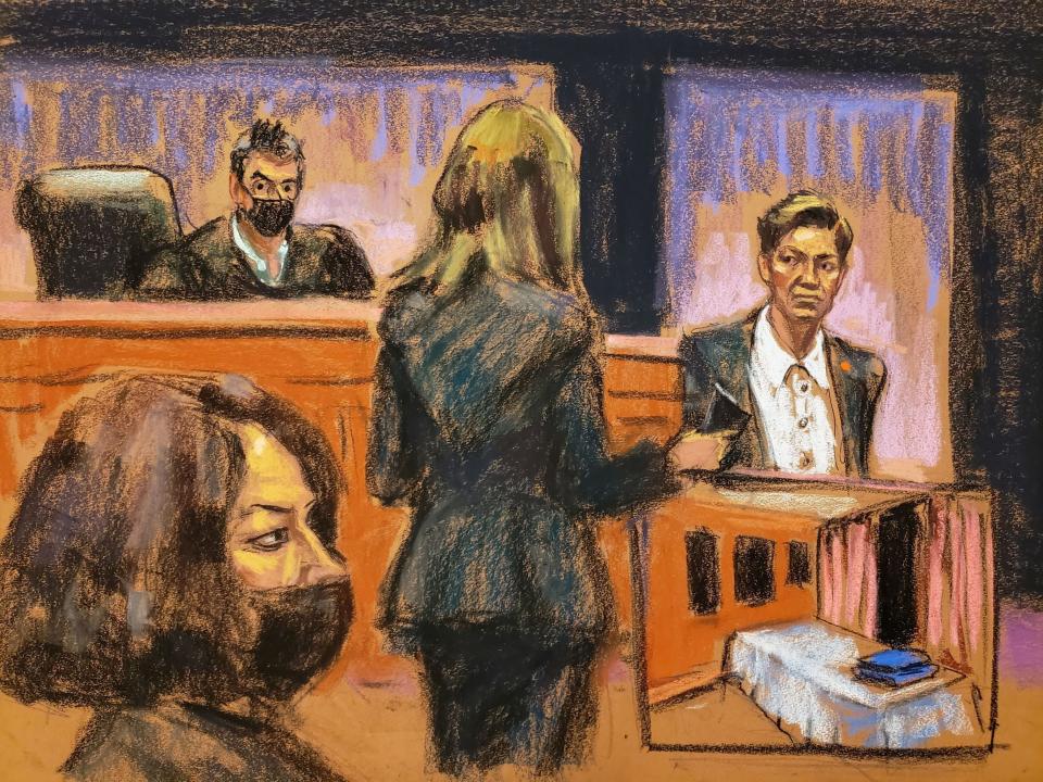 FBI Special Agent Kelly Maguire testifies as a picture of a massage table belonging to Jeffrey Epstein is shown (REUTERS)