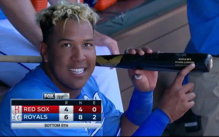 Salvador Perez shows off the Miguel Cabrera bat he used to hit Wednesday's game-winning grand slam. (MLB.TV)