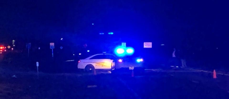 Okaloosa County Sheriff's Office deputies block off the eastbound lanes of U.S. Highway 98 early Thursday morning while investigators process the scene of an alleged homicide. A 26-year-old man was found dead with multiple gunshot wounds.