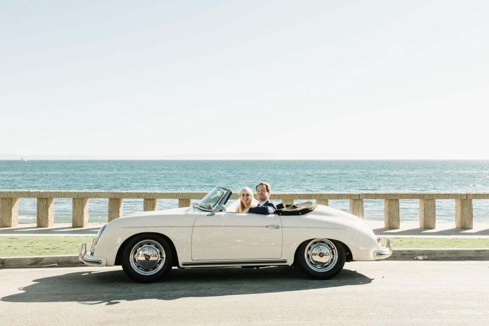 The bride combined California cool with English tradition, wore two Carolina Herrera dresses, and drove off in a vintage Porsche.