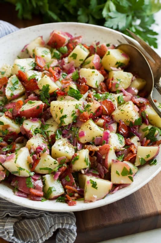 <p>Cooking Classy</p><p>This German red potato salad is made with creamy red potatoes, richly flavorful bacon, parsley bursting with freshness, and vibrant red onions, all tossed with a simple, lightly tangy, perfectly tasty dressing.</p><p><strong>Get the recipe: <a href="https://www.cookingclassy.com/german-potato-salad/" rel="nofollow noopener" target="_blank" data-ylk="slk:German Red Potato Salad;elm:context_link;itc:0;sec:content-canvas" class="link rapid-noclick-resp">German Red Potato Salad</a></strong></p>