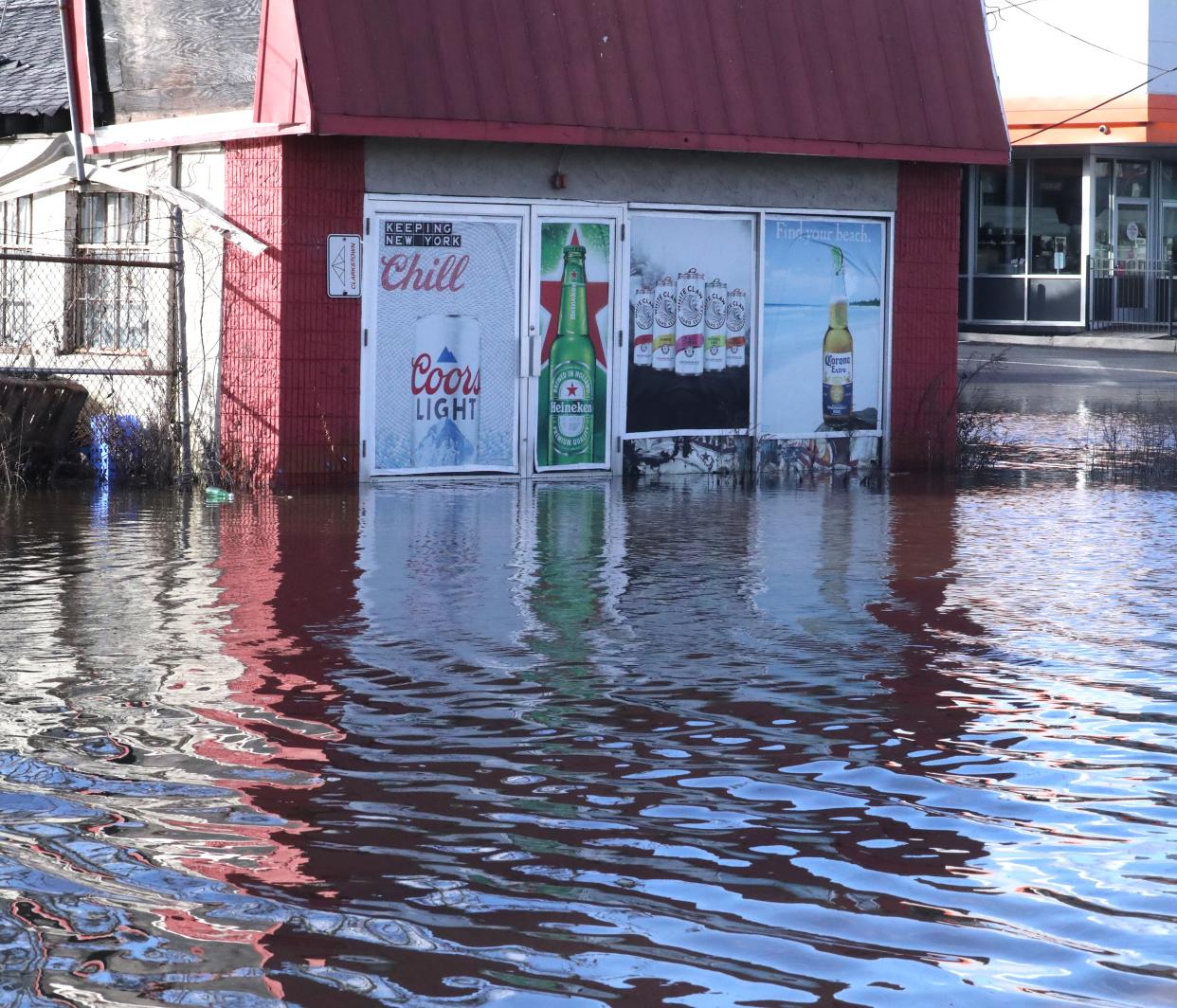 Water reaches the warehouse building of the Route 59 Beverage Discount Center in West Nyack Jan. 10, 2024. Rt. 59 was closed in the area near the Palisades Center because of the flooding.