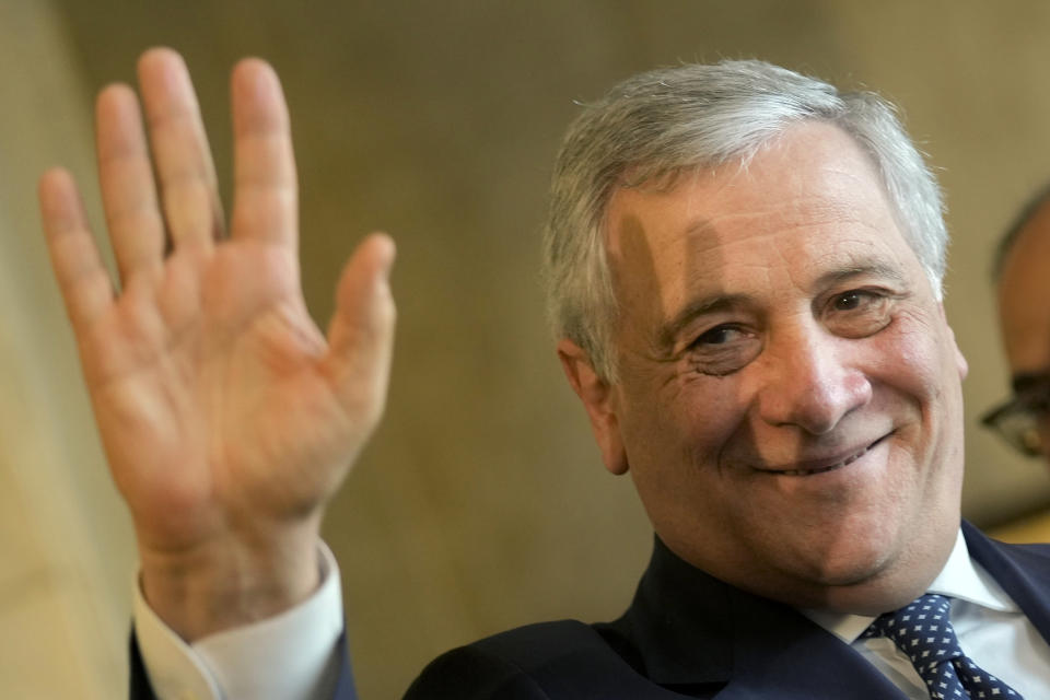 Italian Foreign Minister Antonio Tajani greets reporters as he leaves a press conference with his Egyptian counterpart Sameh Shoukry, at the foreign ministry headquarters in Cairo, Egypt, Sunday, Jan. 22, 2023. (AP Photo/Amr Nabil)