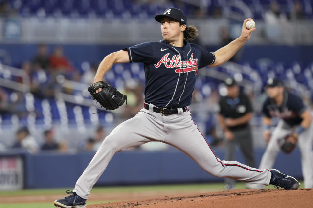Atlanta Braves starting pitcher Dylan Dodd aims a pitch during the first inning of a baseball game against the Miami Marlins, Thursday, May 4, 2023, in Miami. (AP Photo/Marta Lavandier)