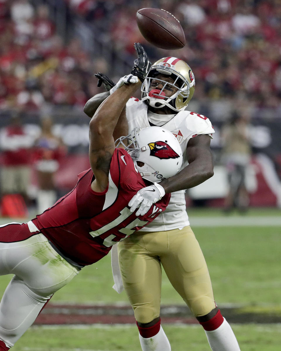 FILE - In this Nov. 13, 2016, file photo, Arizona Cardinals wide receiver Michael Floyd (15) cannot make the catch as San Francisco 49ers cornerback Tramaine Brock defends during the second half of an NFL football game in Glendale, Ariz. Police reported Friday, April 7, 2017, that Brock was arrested in Santa Clara, Calif., Thursday night after being accused of hitting a woman he was dating. (AP Photo/Rick Scuteri, File)