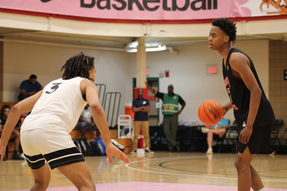 Tre Johnson, right, competes at the Nike EYBL Peach Jam this past summer. A 2024 Texas signee, the 6-foot-5 Johnson was named a McDonald's All-American on Tuesday.