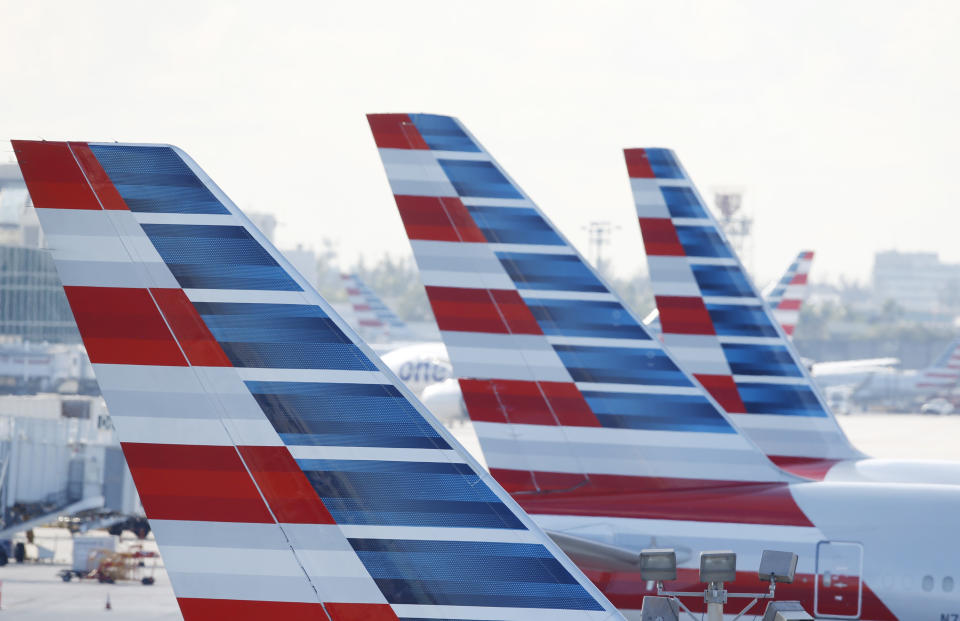 American Airlines passengers are set to have pilots in December for the holidays. (AP Photo/Wilfredo Lee)