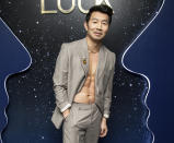 <p>Simu Liu flaunts a chiseled figure in an open suit jacket at Tiffany & Co.'s LOCK event in Toronto, Canada on Jan. 26.</p>