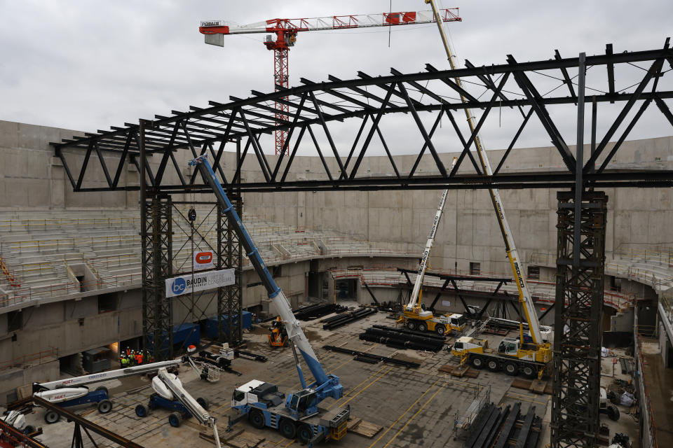 The Paris2024 Olympics Porte de la Chapelle Arena building site is pictured Monday, Jan. 23, 2023 in Paris. The olympic venue will host the badminton and rhythmic gymnastics event and para badminton and para powerlifting with a capacity of 6,700 to 7,000 spectators. (AP Photo/Lewis Joly)