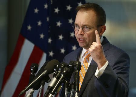 Office of Management and Budget (OMB) Director Mick Mulvaney speaks to the media at the U.S. Consumer Financial Protection Bureau (CFPB), where he began work earlier in the day after being named acting director by U.S. President Donald Trump in Washington November 27, 2017. REUTERS/Joshua Roberts