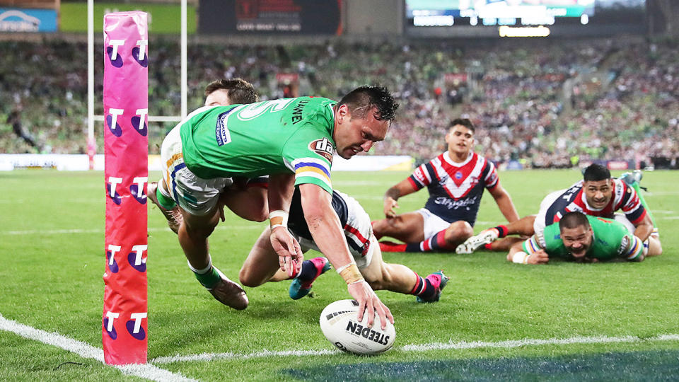 Jordan Rapana of the Raiders dives and slams the ball down on the try line.