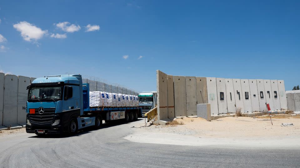 Egyptian trucks carrying humanitarian aid make their way to the Gaza Strip at the Kerem Shalom crossing on May 30, 2024. - Amir Cohen/Reuters/File