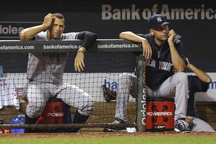 Alex Rodriguez (left) and Derek Jeter came close to being in a bidding war for the Miami Marlins. (AP)