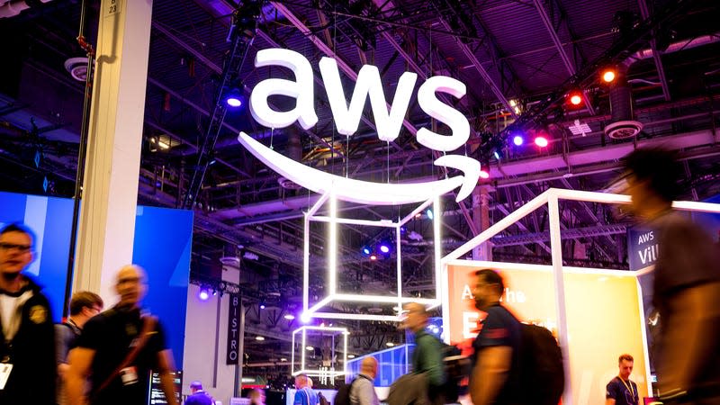 Attendees walk through an expo hall during AWS re:Invent 2022, a conference hosted by Amazon Web Services, at The Venetian Las Vegas on November 29, 2022 in Las Vegas, Nevada.