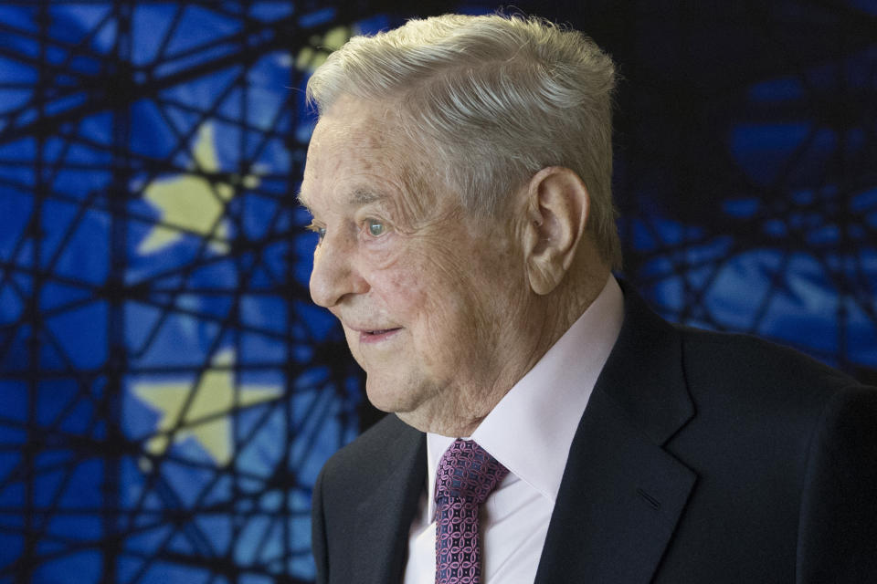 FILE - In this Thursday, April 27, 2017 file photom, George Soros, Founder and Chairman of the Open Society Foundation, waits for the start of a meeting at EU headquarters in Brussels. (Olivier Hoslet/Pool Photo via AP)