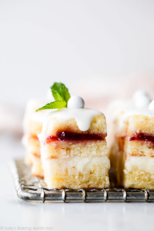 <p>Sally's Baking Addiction</p><p>Delicate and sweet, these lemon berry petit fours are bite-size mini cakes perfect for weddings, parties, tea time, bridal and baby showers. Topped with a simple white chocolate garnish, this petit four recipe is easy and approachable. Perfect for beginners!</p><p><strong>Get the recipe: <a href="https://sallysbakingaddiction.com/lemon-berry-petit-fours/" rel="nofollow noopener" target="_blank" data-ylk="slk:Lemon Berry Petit Fours;elm:context_link;itc:0;sec:content-canvas" class="link rapid-noclick-resp">Lemon Berry Petit Fours</a></strong></p>