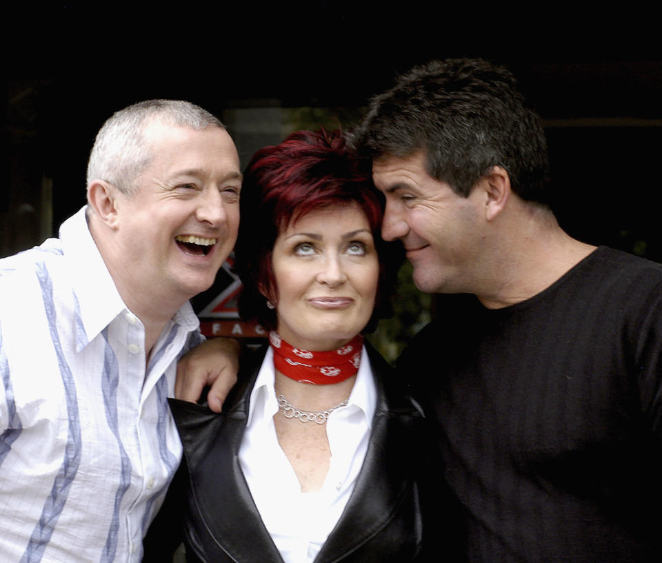 DUBLIN, IRELAND - JULY 6:  Louis Walsh, Sharon Osbourne and Simon Cowell pose for photos after auditioning hundreds of hopeful musicians for their new TV show 