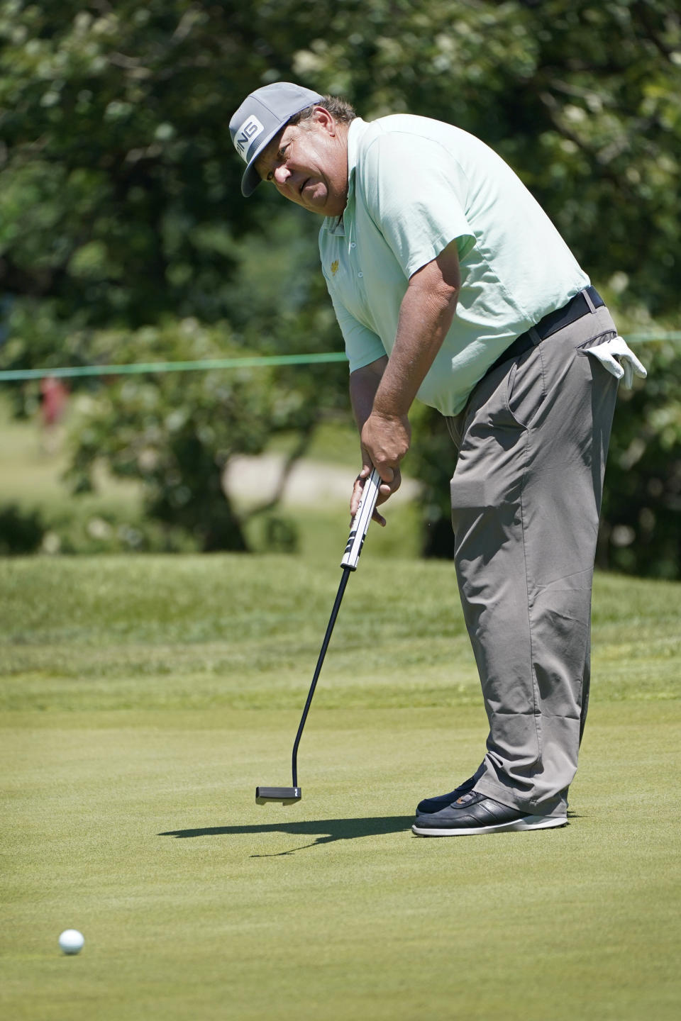 Tim Herron putts on the ninth green during the second round of the PGA Tour Champions Principal Charity Classic golf tournament, Saturday, June 5, 2021, in Des Moines, Iowa. (AP Photo/Charlie Neibergall)